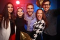 New year party, holidays, celebration, nightlife and people concept - Young people having fun dancing at a party Royalty Free Stock Photo