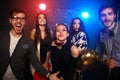 New year party, holidays, celebration, nightlife and people concept - Young people having fun dancing at a party Royalty Free Stock Photo