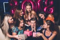 New Year party. Many females for man Royalty Free Stock Photo