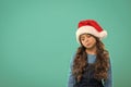 New year party. Santa claus kid. Present for Xmas. Childhood. Happy winter holidays. Small sad girl. Christmas shopping Royalty Free Stock Photo