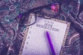 New year 2024 plan and resolution concept text on paper with purple pen and batik on background Royalty Free Stock Photo