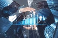 2019 New year planning business and financial concept.Man`s holding virtual screen with business graph.digital marketing and paym Royalty Free Stock Photo