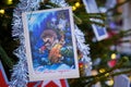 New Year postcard with a hedgehog a musician and a Christmas tree - Moscow, Russia, December, 24, 2019