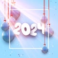 2024 New Year poster with white paper lettering on light blue morning background with Christmas balls and sun rays Royalty Free Stock Photo