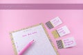 New year resolution concept and goals for greeting card template with paper and sticker on pink background Royalty Free Stock Photo