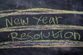 New Year Resolution handwritten text with colorful chalk on blackboard background Royalty Free Stock Photo