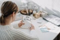 New year resolution, New goals, Start new year, planning and setting goals for the next year. Woman in white sweater