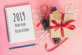 2019 New Year Resolution, top view brown gift box, notebook and Royalty Free Stock Photo