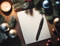 New Year resolutions or Christmas letter to Santa. Blank paper with copy space and festive decorations on table. Goals,