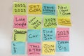 New year 2023 resolutions and goals written on a sticky notes on a white isolated background Royalty Free Stock Photo