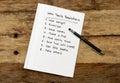 2019 New Year Resolutions list written on notebook on wood table in plans for Better life goals Royalty Free Stock Photo