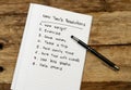 2019 New Year Resolutions list written on notebook on wood table in plans for Better life goals Royalty Free Stock Photo