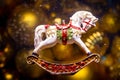 new year retro toy horse on a golden background