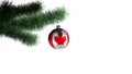 New Years ball with the flag of Canada on a Christmas tree branch isolated on white background. Christmas and New Year concept Royalty Free Stock Photo