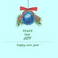 New Year\'s card 2022. blue ball with spruce branch, red ribbon on green background Royalty Free Stock Photo