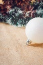 New Year's and Christmas balls with cones on wood background