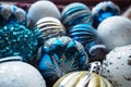 New Year's Christmas balls and decorations close up. A lot of decoration of golden, blue, yellow, white, silver Royalty Free Stock Photo