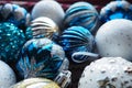 New Year's Christmas balls and decorations close up. A lot of decoration of golden, blue, yellow, white, silver Royalty Free Stock Photo