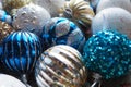 New Year's Christmas balls and decorations close up. A lot of decoration of golden, blue, yellow, white, silver Royalty Free Stock Photo