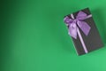 new year`s Christmas holiday mother`s day Valentine`s day birthday anniversary gift box black with purple purple fuchsia colors wi Royalty Free Stock Photo