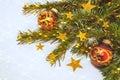 New Year`s, Christmas still life with balls and gold stars on the background of Christmas tree with bokeh. Close up. Copy space t Royalty Free Stock Photo