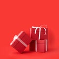 New YearÃ¢â¬â¢s concept of Christmas presents. Large red boxes with white ribbon. A gift is the perfect way to show love