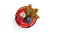 New year`s cupcake with red buttercream, decorated with blueberries, gingerbread snowflake and a sprig of firtree. Top