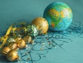 New Year's decoration - blue, gold balls and a globe Royalty Free Stock Photo