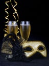 New Year`s Eve carnival mask and champagne Royalty Free Stock Photo