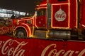 A New Year\'s Eve, Christmas Eve, Santa Claus Coca-Cola van drives through the evening city Austria, Vienna, December