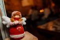 New Year`s Eve dÃÂ©cor. Christmas rag doll angel decorates the cafe room. Lifestyle. Royalty Free Stock Photo