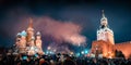 New Year`s Eve in Moscow. Fireworks on Red Square near the Spasskaya Tower on New Year`s Eve. Multicolored salute in the Royalty Free Stock Photo