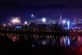 New Year`s fireworks show in Warsaw, Poland at night, view from the Vistula River Royalty Free Stock Photo