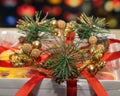 New Years gift on the background of multi-colored blurred background. christmas present Royalty Free Stock Photo