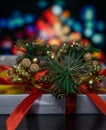 New Years gift on the background of multi-colored blurred background. christmas present Royalty Free Stock Photo