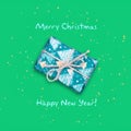 New Year`s gift on a green background. Christmas, New Years` background