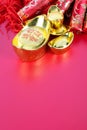 New Year`s gold ingot ornaments and firecracker pendants Royalty Free Stock Photo