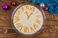 New Year`s holiday salad `Clock` on a wooden table Royalty Free Stock Photo