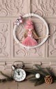 New Year's home decor. Interior design. A wreath on the fireplace, a vintage clock and fir branches.