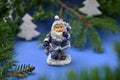 New Year\'s home decor Santa Claus figurine among fir branches Royalty Free Stock Photo