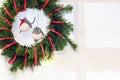 New year`s interior. Christmas wreath. Toy birds bullfinches Royalty Free Stock Photo
