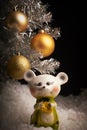 New year.White snow.Silver tree.Golden ball.Mouse. cheese