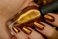 golden nail polish