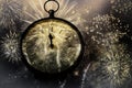 new Year& x27;s at midnight - clock at twelve o& x27;clock with holiday lights and fireworks Royalty Free Stock Photo