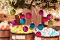 New Year`s multi-colored balls hang from above. Christmas decorations Royalty Free Stock Photo