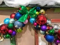 New Year`s multi-colored balls hang from above. Christmas decorations Royalty Free Stock Photo