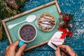 New Year`s photo of tea with picture of snowflake, cake