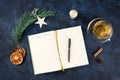 New Year\'s resolutions, flat lay shot from above with the handwritten words and copy space, on a dark blue background with Royalty Free Stock Photo