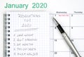 New Year`s Resolutions listed in a circular notepad Royalty Free Stock Photo