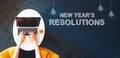 New Year`s Resolutions with person using a laptop